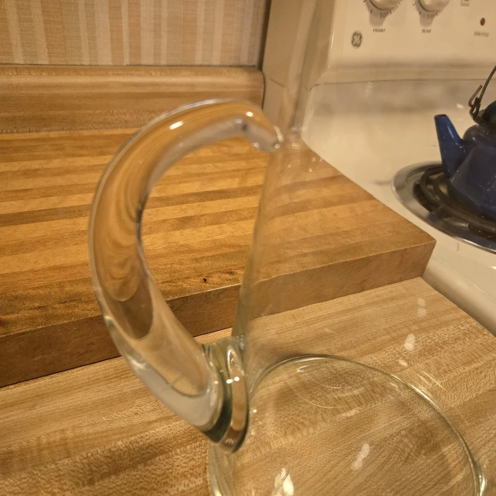 Hand blown glass pitcher